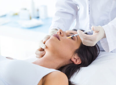 beautiful-young-woman-getting-botox-cosmetic-injection-in-her-face (1)